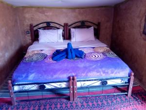 Postel nebo postele na pokoji v ubytování Camp Desert Stars