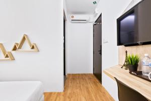 TV a/nebo společenská místnost v ubytování Rica Hotel Usj