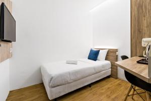 TV a/nebo společenská místnost v ubytování Rica Hotel Usj