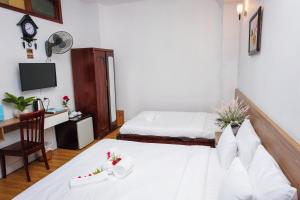 Postel nebo postele na pokoji v ubytování H79 HOTEL