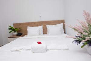 Postel nebo postele na pokoji v ubytování H79 HOTEL
