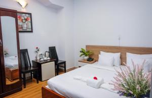 Postel nebo postele na pokoji v ubytování H79 HOTEL