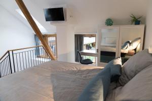 Postel nebo postele na pokoji v ubytování Wenkheimer Hof Ferienwohnung