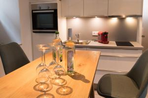Kuchyň nebo kuchyňský kout v ubytování Wenkheimer Hof Ferienwohnung