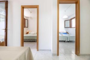 Ένα ή περισσότερα κρεβάτια σε δωμάτιο στο Residence Elena