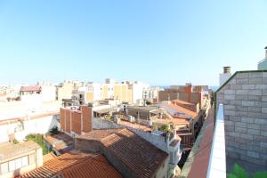 Výhľad na mesto Calella alebo výhľad na mesto priamo z apartmánu