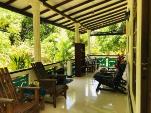 Posezení v ubytování Sigiri Saman Home Stay