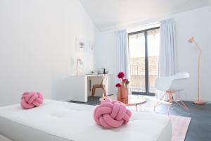 เตียงในห้องที่ Au Clos du Lac +66 ภาพ