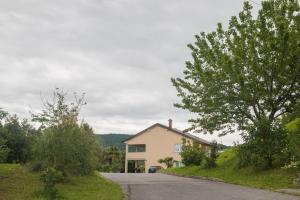a house on the side of a road at Studio ELLI KOPER in Koper