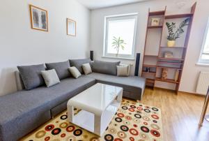 Χώρος καθιστικού στο Apartman Hugo