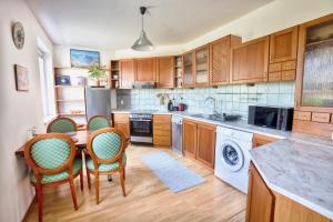 Η κουζίνα ή μικρή κουζίνα στο Apartman Hugo