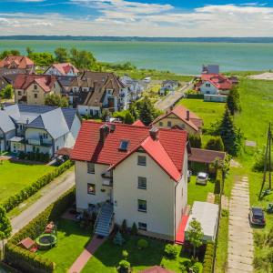 an aerial view of a town with houses at Pokoje Pawel Jakubik in Krynica Morska