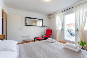 Posteľ alebo postele v izbe v ubytovaní Central View Apartment