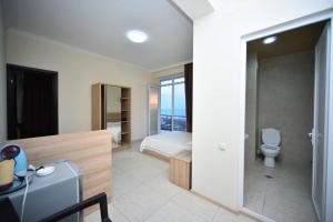 Baðherbergi á SUNSHINE Hotel Kvariati