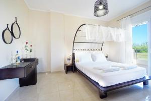 Postel nebo postele na pokoji v ubytování Geas House Thalassa