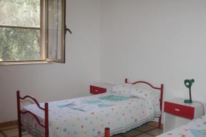 Voodi või voodid majutusasutuse Albergo 2 Pini toas