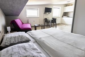 Postel nebo postele na pokoji v ubytování Apartmán Theo