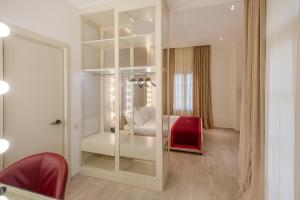 Postel nebo postele na pokoji v ubytování LETO Boutique Hotel Zugdidi