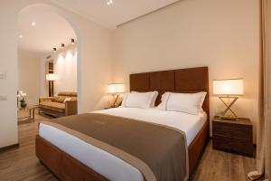 Postel nebo postele na pokoji v ubytování LETO Boutique Hotel Zugdidi