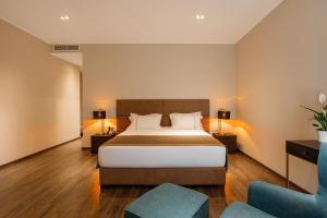 Postel nebo postele na pokoji v ubytování LETO Boutique Hotel Zugdidi