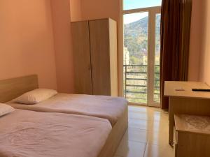 Letto o letti in una camera di SBakuri