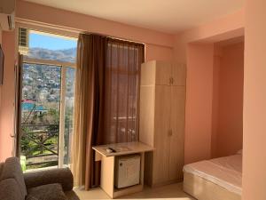 Letto o letti in una camera di SBakuri
