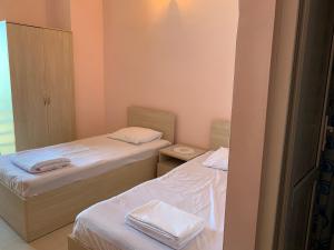 Letto o letti in una camera di SBakuri