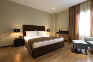 Postel nebo postele na pokoji v ubytování LETO Boutique Hotel Zugdidi