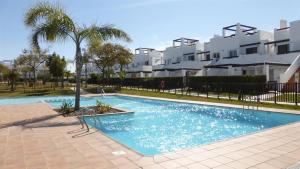 The swimming pool at or close to 2 bed apartment on Condado De Alhama with roof solarium N5