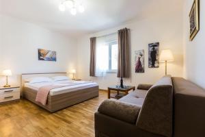 Posteľ alebo postele v izbe v ubytovaní Stine Apartment