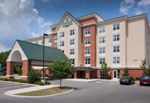 a rendering of a hotel with a parking lot at Country Inn & Suites by Radisson, Knoxville at Cedar Bluff, TN in Knoxville