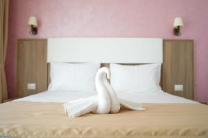 Postel nebo postele na pokoji v ubytování Valurile Mării Vama - Veche