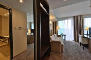 Łóżko lub łóżka w pokoju w obiekcie HAVET Hotel Resort & Spa