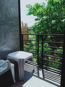 En balkon eller terrasse på Loftel @ Nakhon
