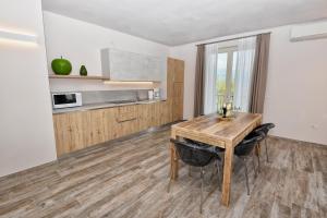 Kuchyňa alebo kuchynka v ubytovaní Verdeulivo Relax Home - Ruculì Hospitality
