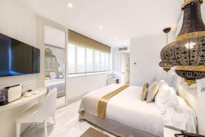 Postel nebo postele na pokoji v ubytování Hotel Saray