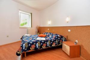 Postel nebo postele na pokoji v ubytování Pool Apartments 624 + 37 fotografií