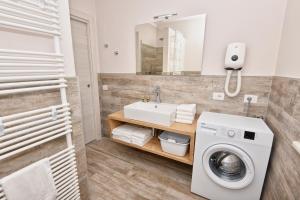 Kúpeľňa v ubytovaní Verdeulivo Relax Home - Ruculì Hospitality