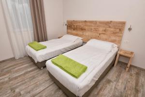 Posteľ alebo postele v izbe v ubytovaní Verdeulivo Relax Home - Ruculì Hospitality