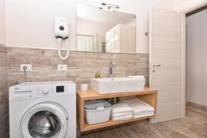 Kúpeľňa v ubytovaní Verdeulivo Relax Home - Ruculì Hospitality