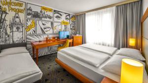 Posteľ alebo postele v izbe v ubytovaní Hotel Uno Prague