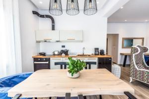 Kuchyň nebo kuchyňský kout v ubytování Portes Suites & Villas Mykonos