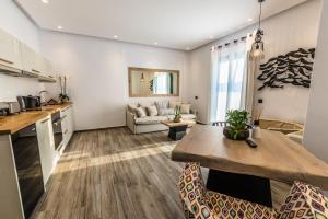 Kuchyň nebo kuchyňský kout v ubytování Portes Suites & Villas Mykonos