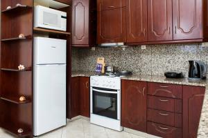 Kuchyňa alebo kuchynka v ubytovaní Mavros Molos Seaside Apartment