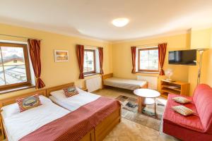 Postel nebo postele na pokoji v ubytování Hotel Admiral