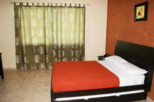 Voodi või voodid majutusasutuse Hotel Marvento II toas