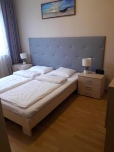 Posteľ alebo postele v izbe v ubytovaní Apartament na Wydmie Ustka