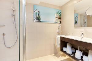 Ett badrum på Universal Apartamentos Laguna Garden