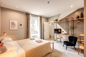 Postel nebo postele na pokoji v ubytování Hotel King