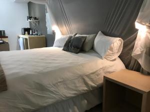 Postel nebo postele na pokoji v ubytování Bryan's View